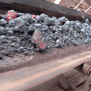 burning coal being conveyed via a conveyor belt