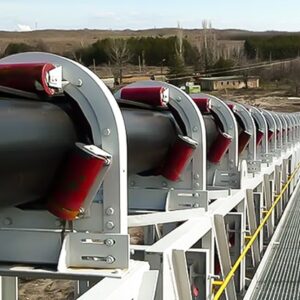 pipe conveyor belts transports materials in a large field